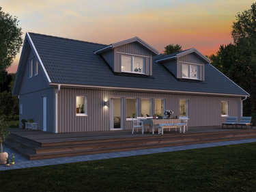 Kveldsbilde av huset Edvard med standard takvinkel og to ark på taket