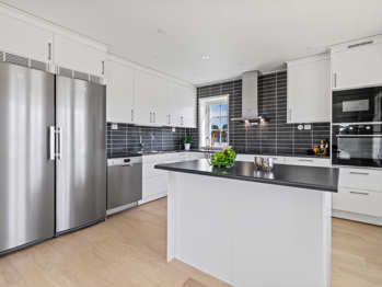 Bilde av kjøkken med rustfri innbygningspakke fra Electrolux