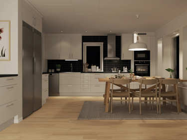 Kveldsbilde av kjøkken i vinkelhuset Josefine