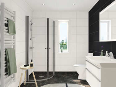 Bilde av det store badet i vinkelhuset Josefine med baderomsinnredning og hvite våtromspaneler og sort fondvegg