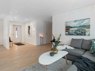 Bilde av stue i retning hallen i vinkelhuset Regina